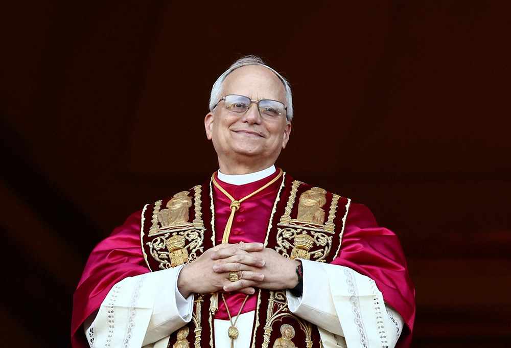 Cardinal Robert Francis Prevost, who has chosen the papal name Leo XIV, appears on the central balcony of St. Peter's Basilica at the Vatican May 8, 2025, following his election during the conclave. He is the first American pope in history. (OSV News photo/Yara Nardi, Reuters)