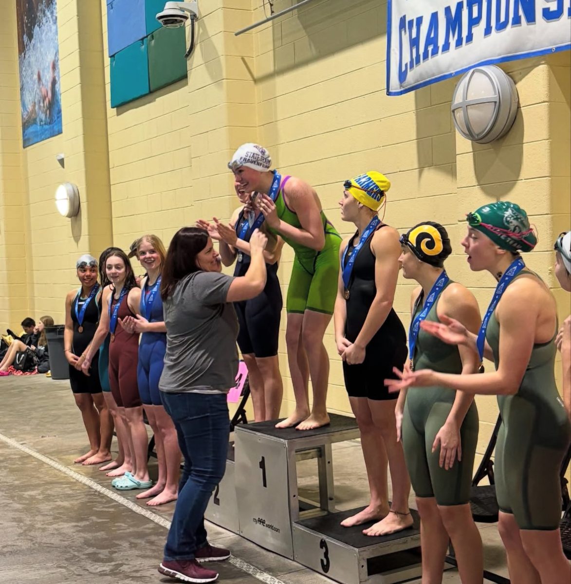Senior Lorelai Frauenfelder leads the way for Holy Family Swimming.
